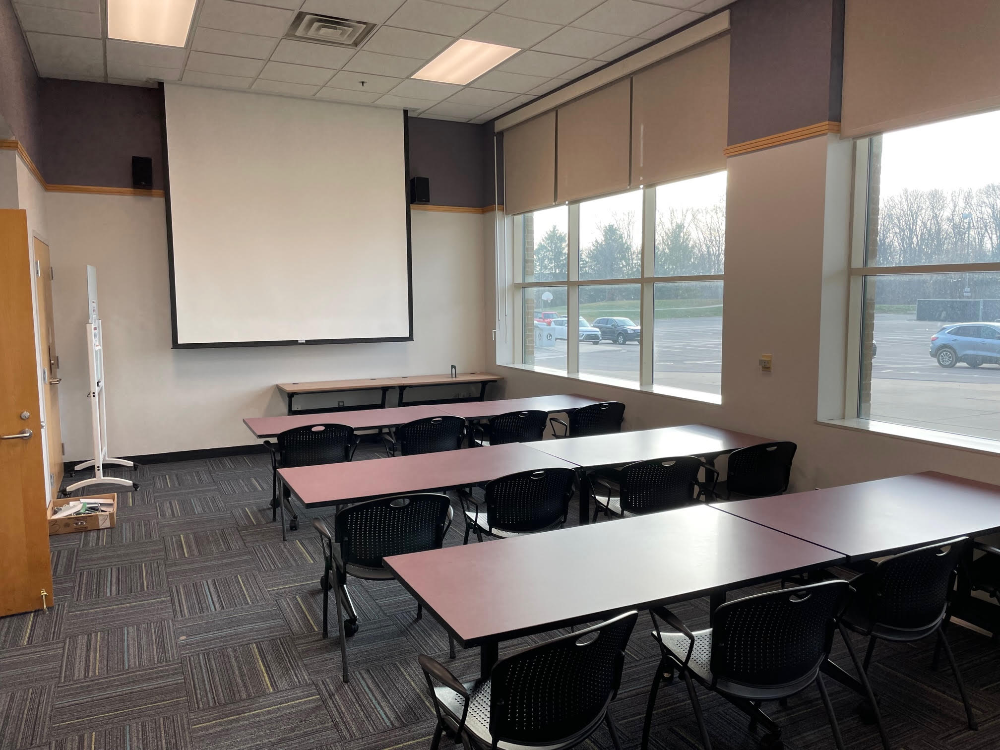 the WPL meeting room with three rows of tables and chairs