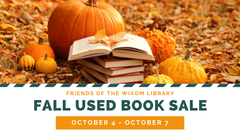 Friends Fall used book sale October 4-7. Photo of stack of open books on top of autumn leaves.